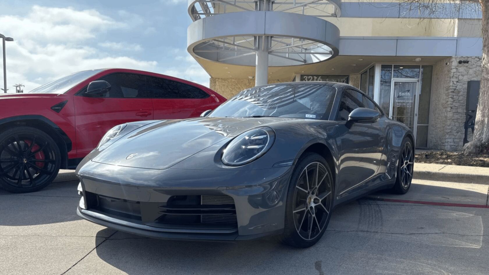 Lot intake photo of a car in the dealership lot