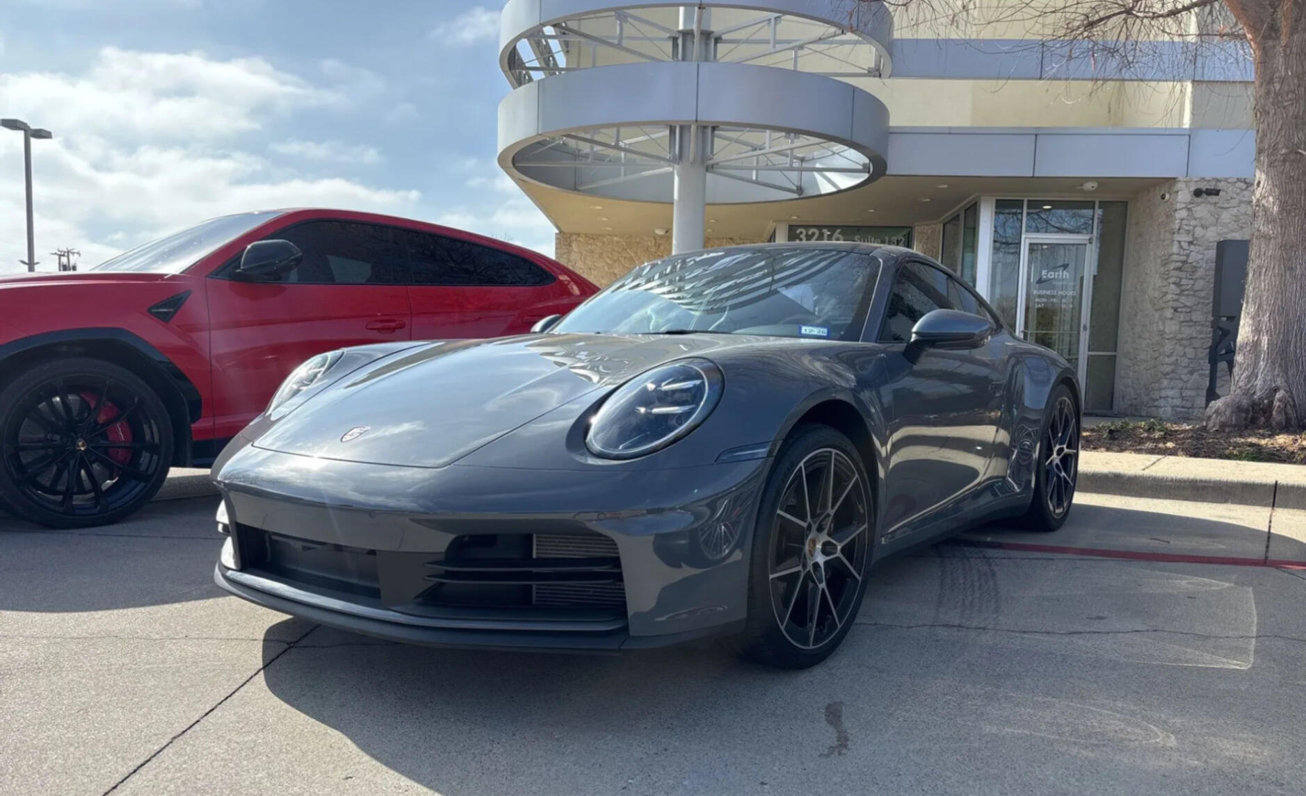 Lot intake photo of a car in the dealership lot